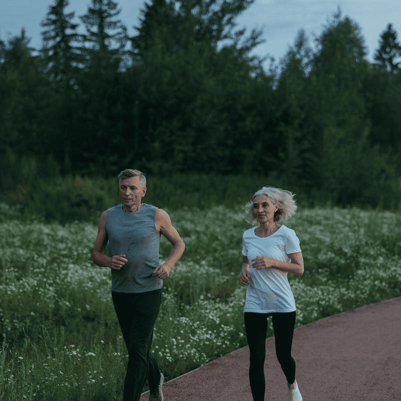 Mature Couple Jogging Together